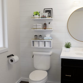 WOPITUES over-toilet bathroom shelf adds extra storage space.