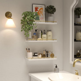 WOPITUES display of photos and art on wall shelves