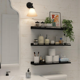 WOPITUES wall display shows plants and frames arranged stylishly.