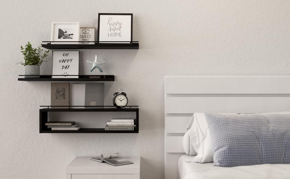 WOPITUES wall shelves securely mounted to hold frames, towels, and plants.