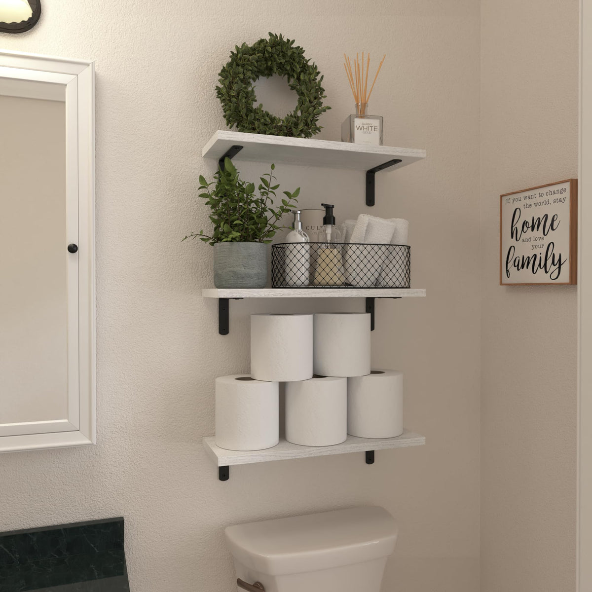WOPITUES white floating shelf in living room holds books and decor items.
