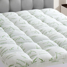 WQSPRING king topper with plush pillow-top for enhanced comfort and support.
