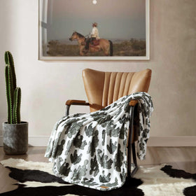 Wrangler plush throw draped on couch for extra warmth during movie nights.