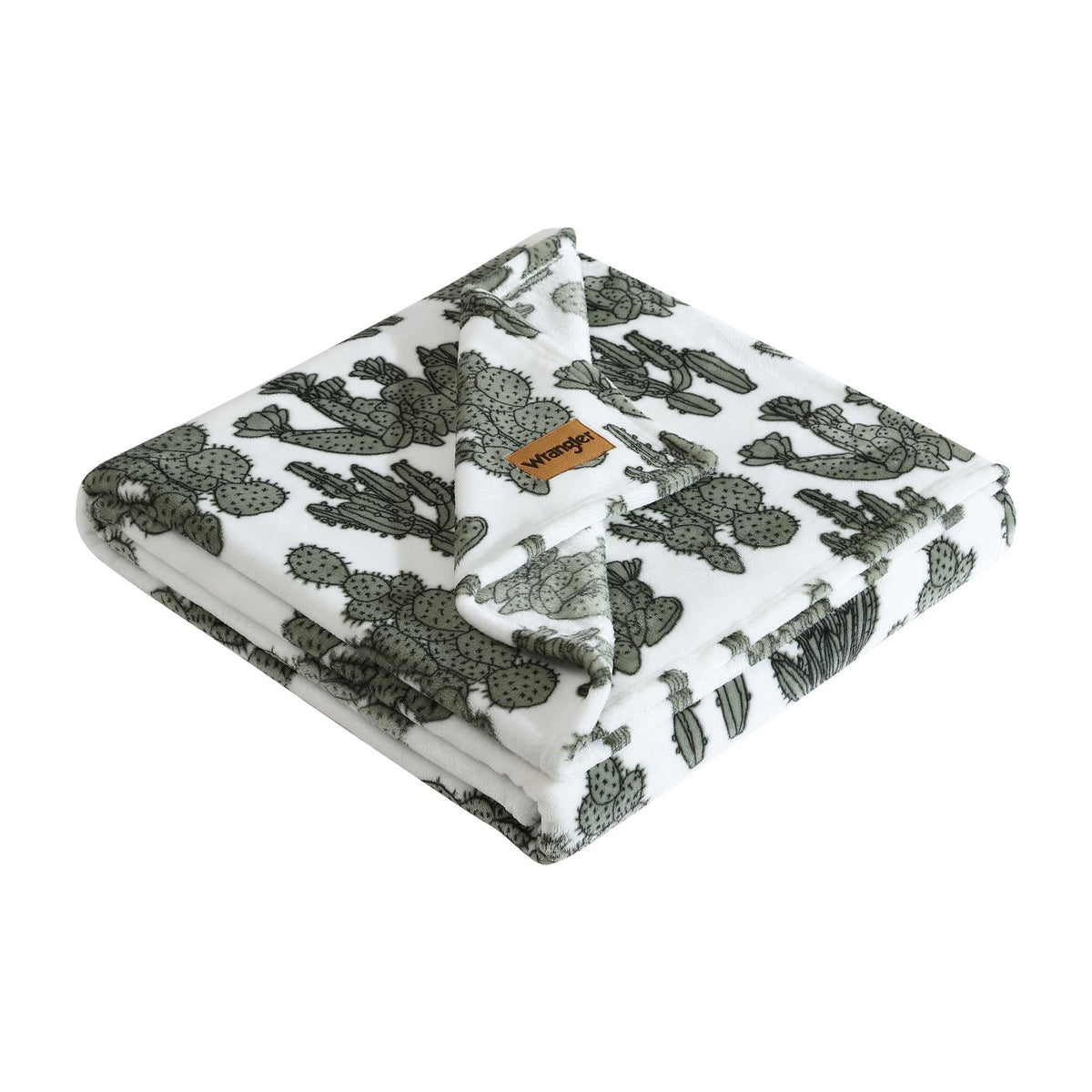 Wrangler plush blanket in cactus garden green adds cozy warmth to living room.