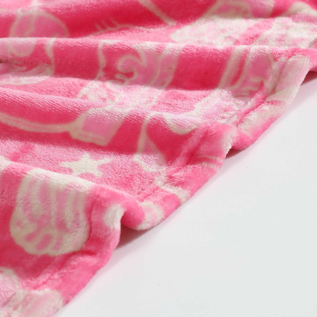 Wrangler Yellowstone-inspired pink blanket close-up shows ultra-soft fleece.
