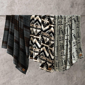 Wrangler Sherpa throw bed-side drape creates warm evenings in bed