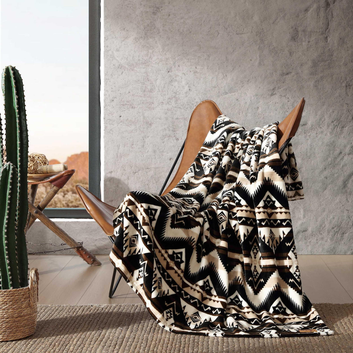Wrangler Sherpa throw folded on armchair adds quick warmth and style