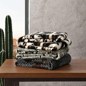 Wrangler Sherpa throw living room scene shows lightweight warmth
