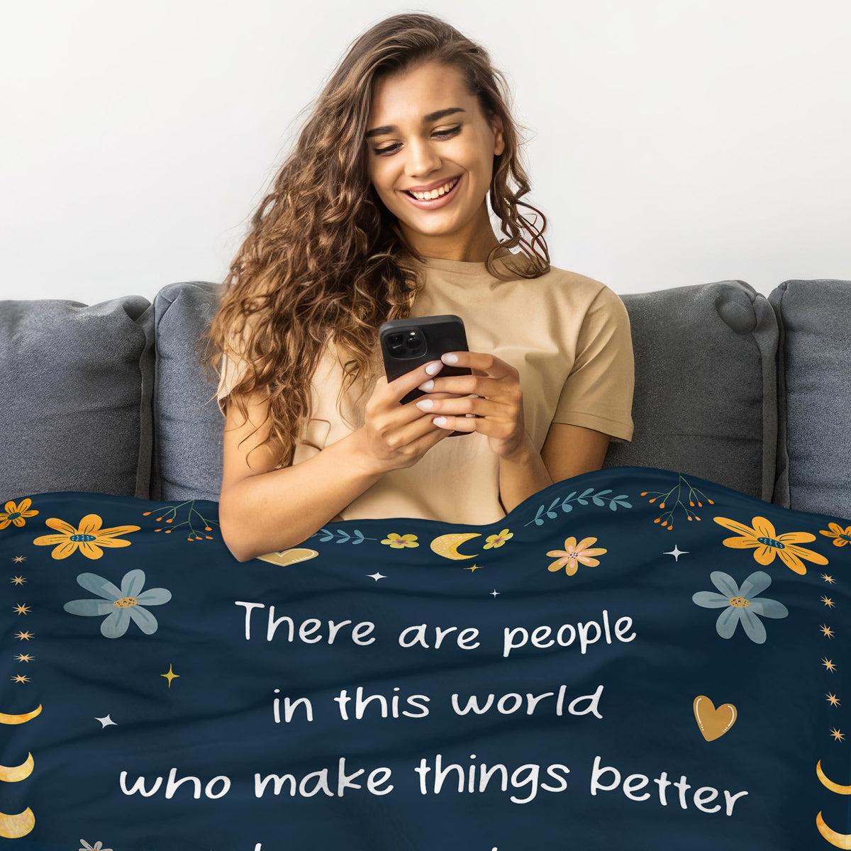 WRAPIX 60x80 fleece throw on bed demonstrates everyday comfort for recipients.