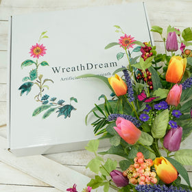 WreathDream butterflies add delicate color and natural charm to the wreath.