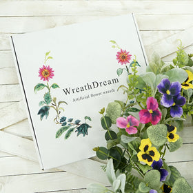 WreathDream fern-branches wreath adds natural depth to fireplace or hallway