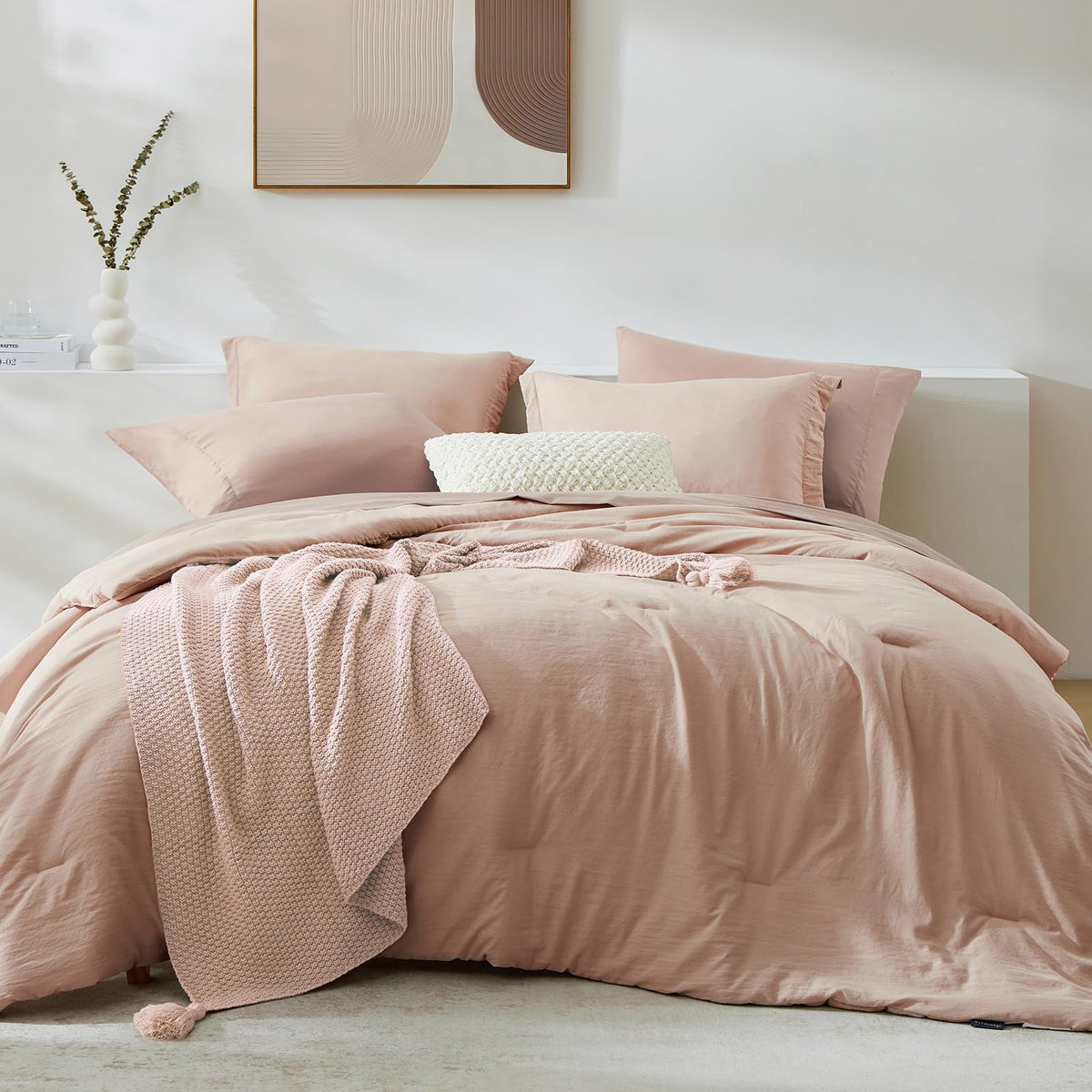 WRENSONGE queen comforter in clay pink adds soft color and cozy texture.