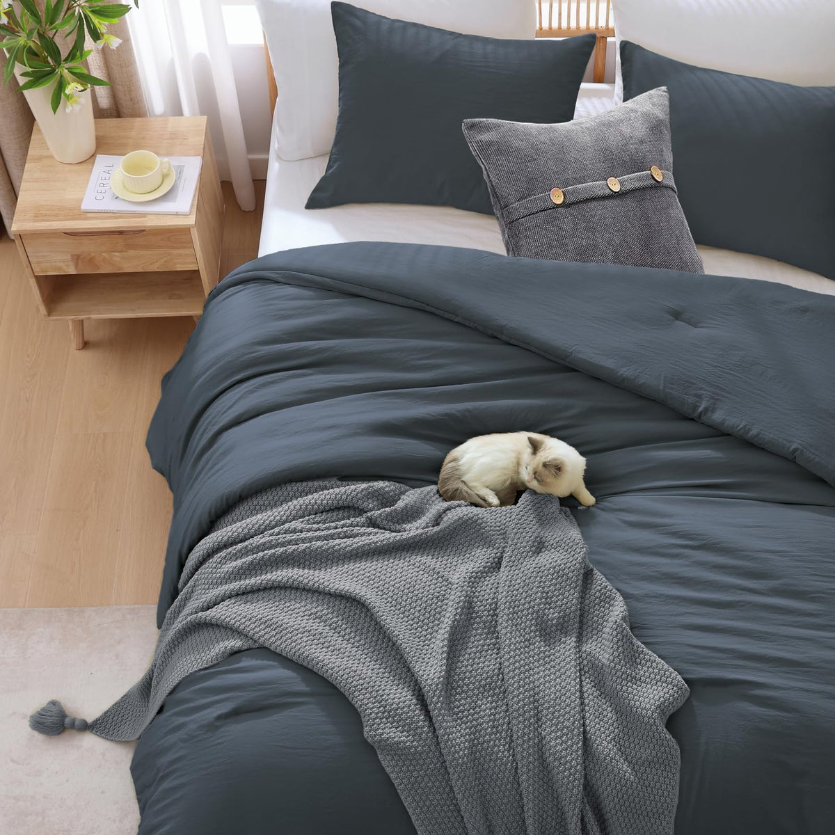 Wrensonge minimalist bedroom styling with clean lines.