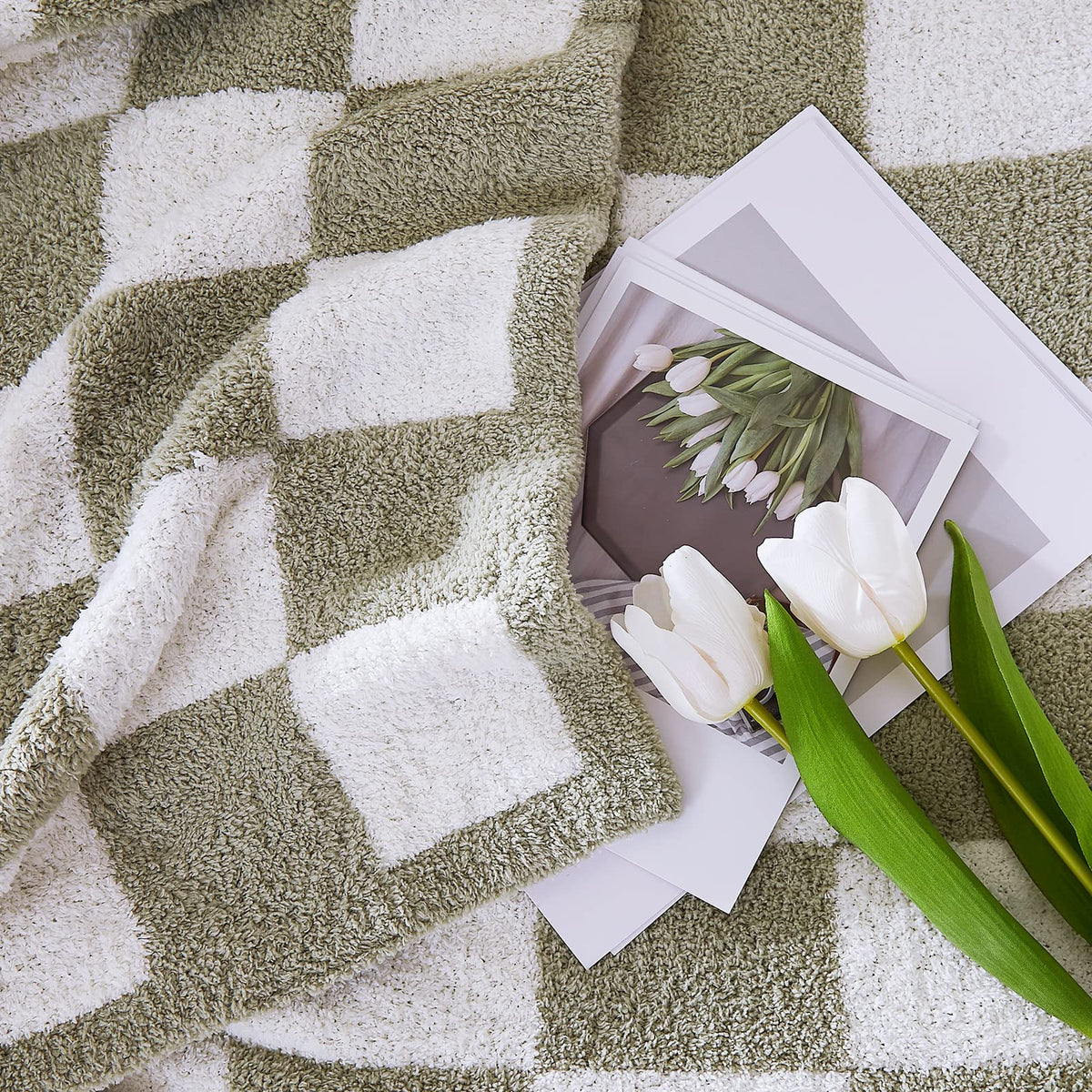 wrensonge checkered throw on bed for lounging and warmth