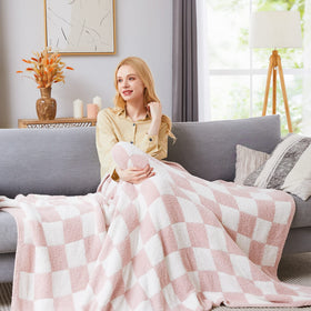 WRENSONGE handmade checkered throw on sofa enhances living room style.
