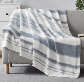 Wrensonge grey blue throw blanket on couch adding warmth and texture.
