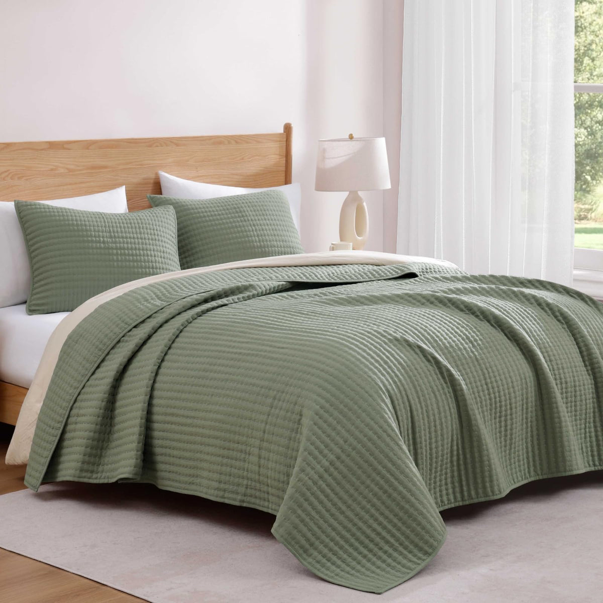 WRENSONGE pillow shams with piping provide durable, tidy bed styling.