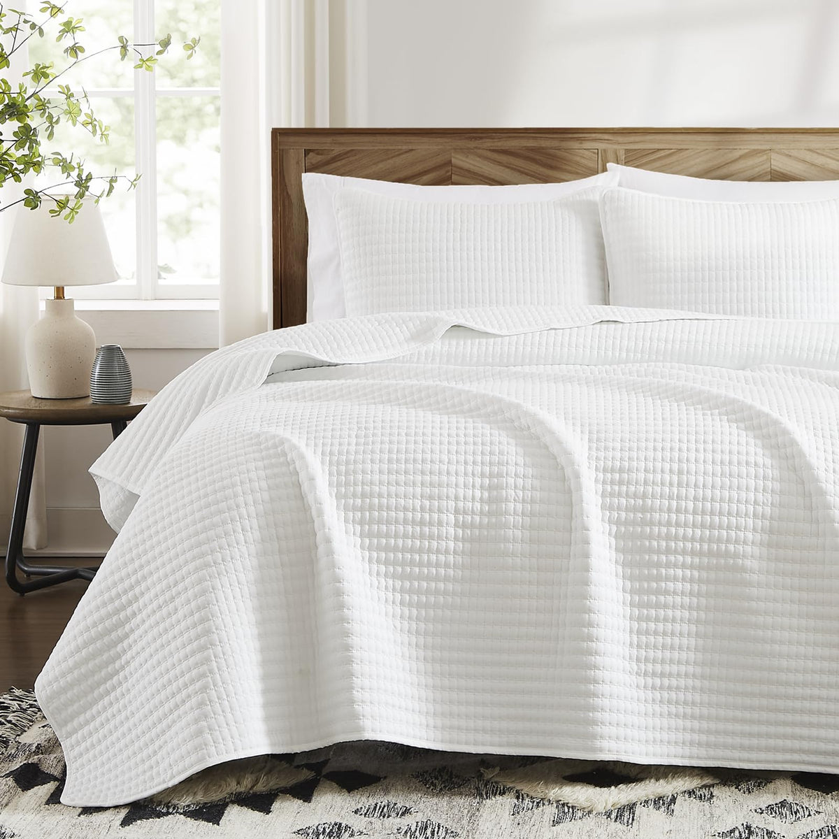 WRENSONGE quilt close-up showing square stitching and durable construction.