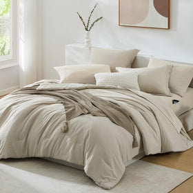 WRENSONGE king-size set showcases included sheets for quick, complete bed setup.