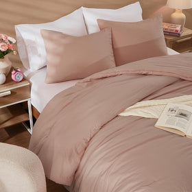 WRENSONGE lightweight all-season comforter ready for year-round use on bed