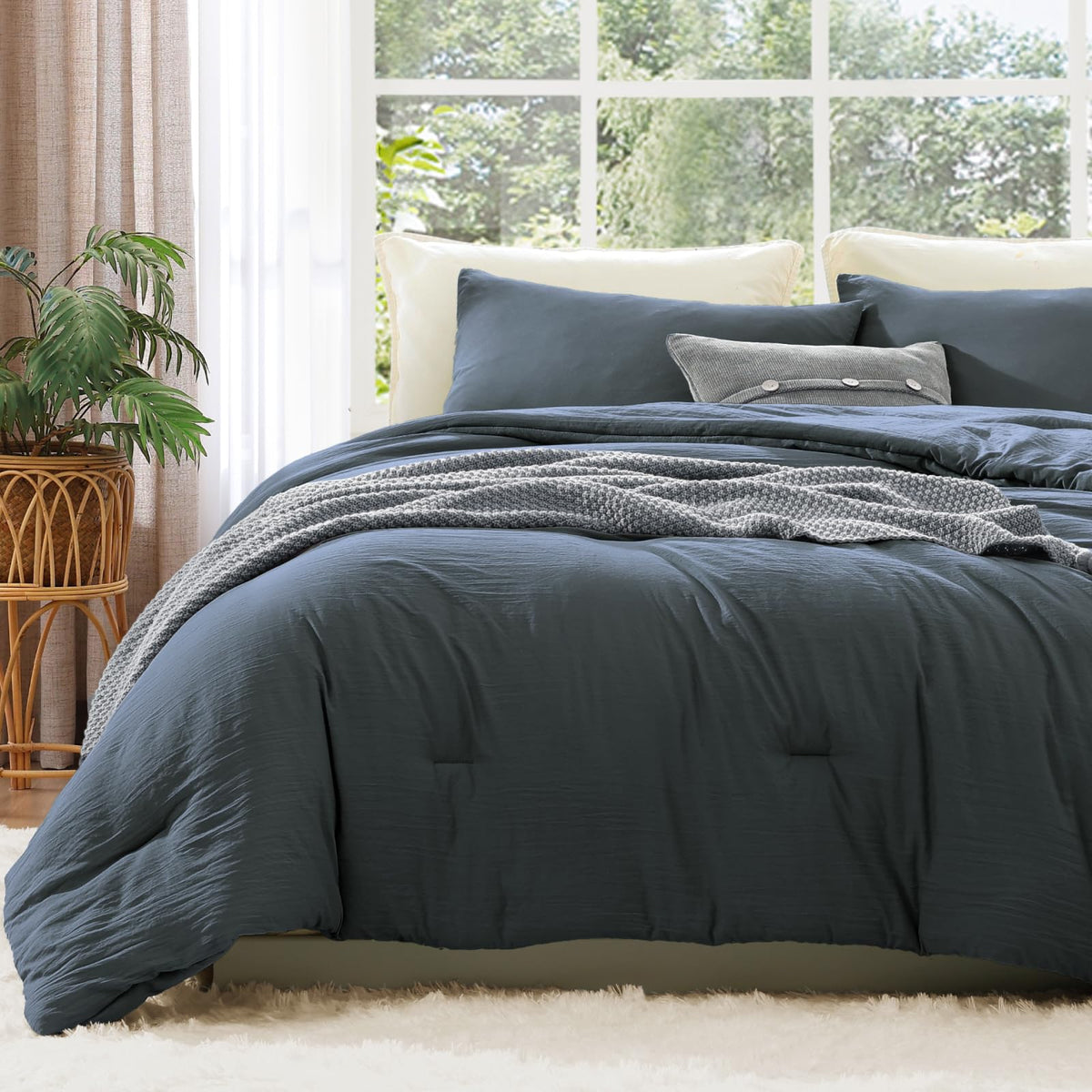 Wrensonge queen comforter in blue-gray for versatile year-round styling.