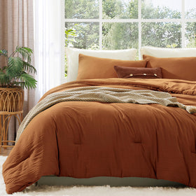 WRENSONGE queen comforter burnt orange on bed, offering cozy warmth and modern style.