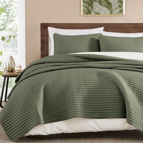 WRENSONGE queen quilt in olive green adds stylish, breathable all-season comfort.