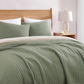 Close-up of WRENSONGE fabric texture shows soft, breathable feel.