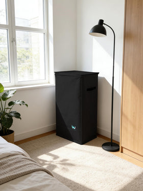 WTREE laundry hamper in use concealing clutter with tall profile
