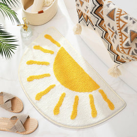 Wunila half-circle rug with sunrise design adds cozy feet and style to bathroom decor