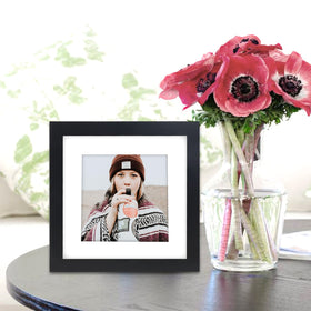 WUTL 6x6 black picture frame on table with included stand