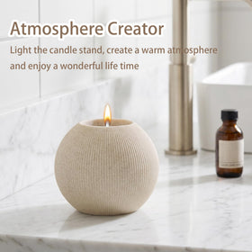 WUUAHOME sandstone candle holder adds ambient glow to bath or vanity.