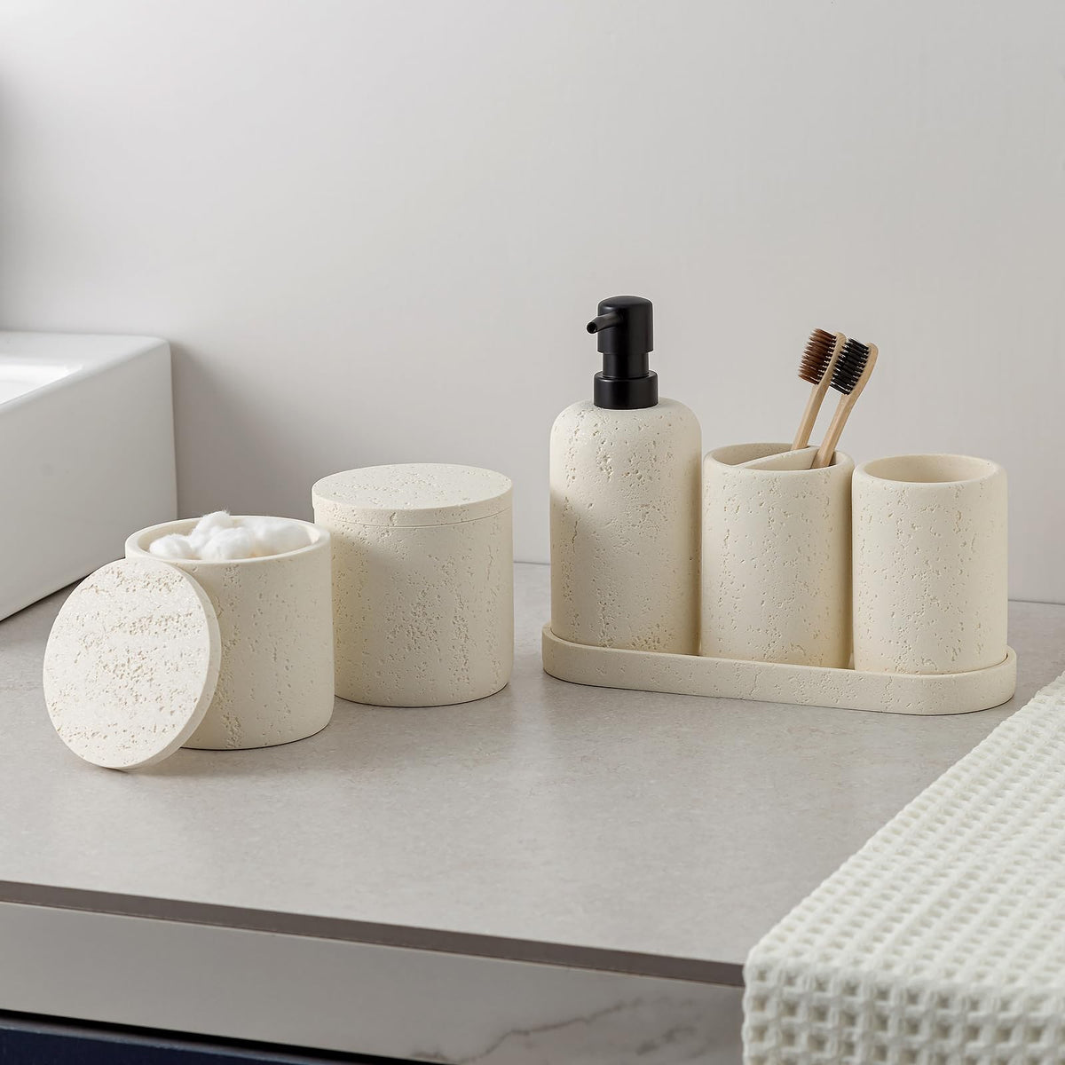 WUUAHOME travertine set on countertop enhances any bathroom decor.
