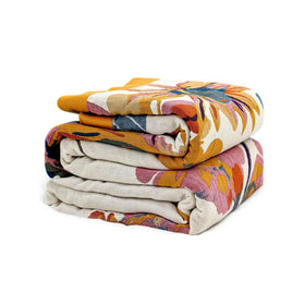 Wzvzss boho throw blanket with floral design adds color and soft warmth.