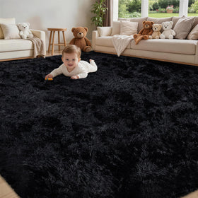 Xafir 6x9 black ultra-soft fluffy rug adds cloud-like comfort to living rooms.