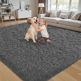 Xafir 8x10 Dark Grey area rug with soft-pile texture ideal for cozy living rooms.