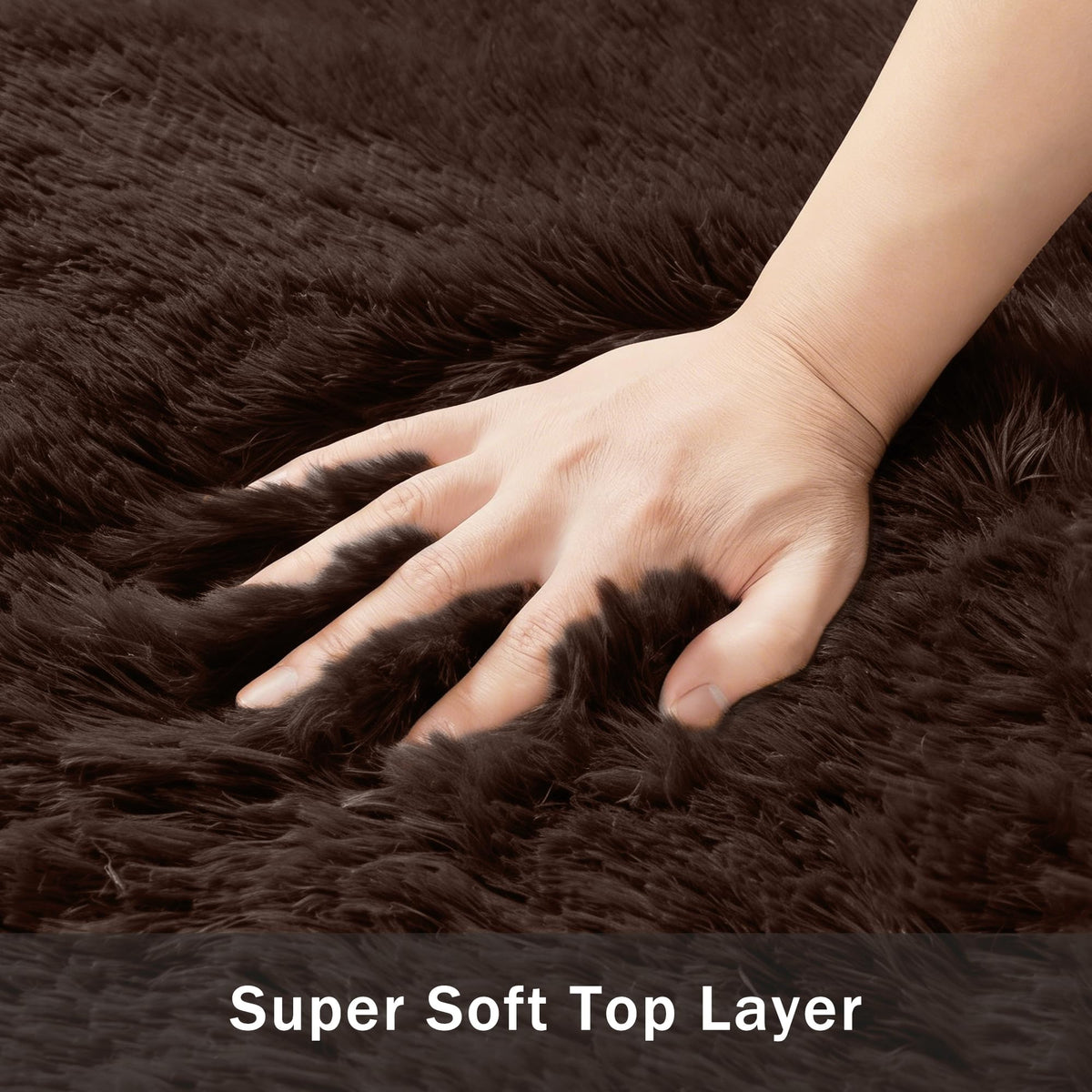 Xafir dark brown rug hides stains in busy entryways