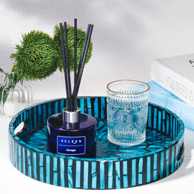 Xcleen dark blue bottle adds elegant accent to living room decor