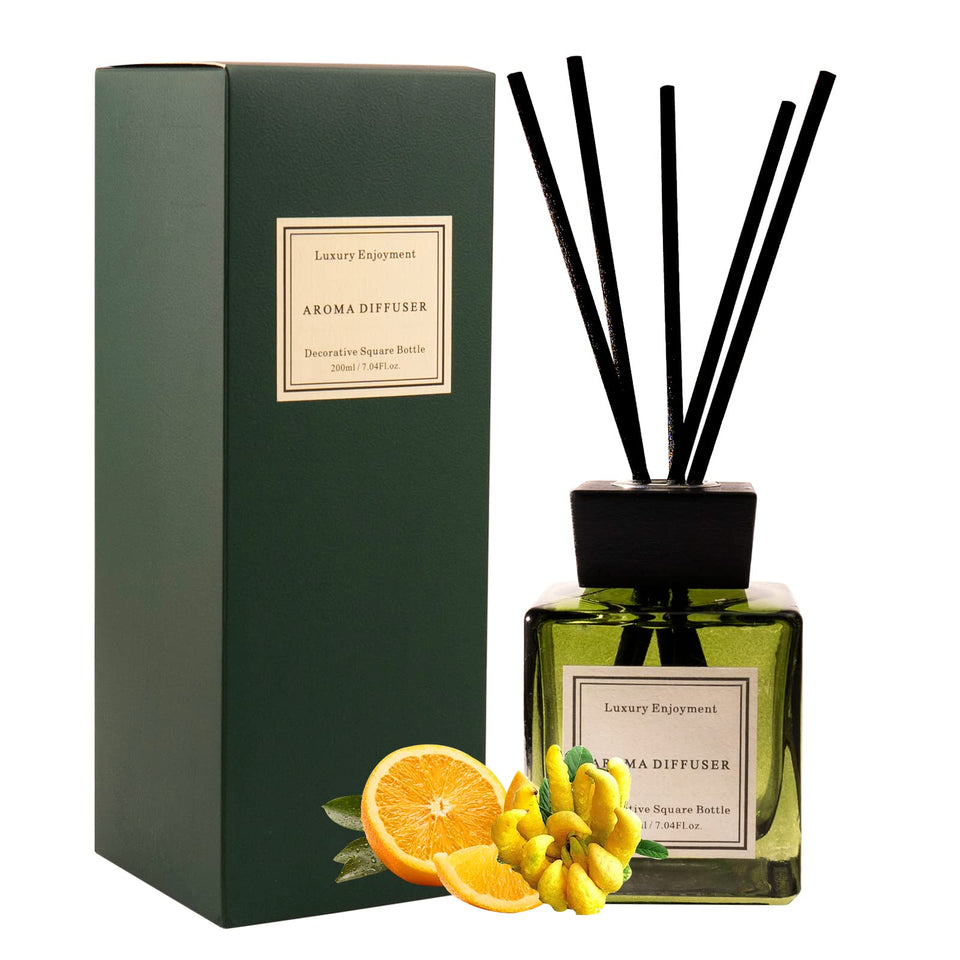 XEPTLE Oud Bergamot diffuser bottle with green glass for elegant ambiance.