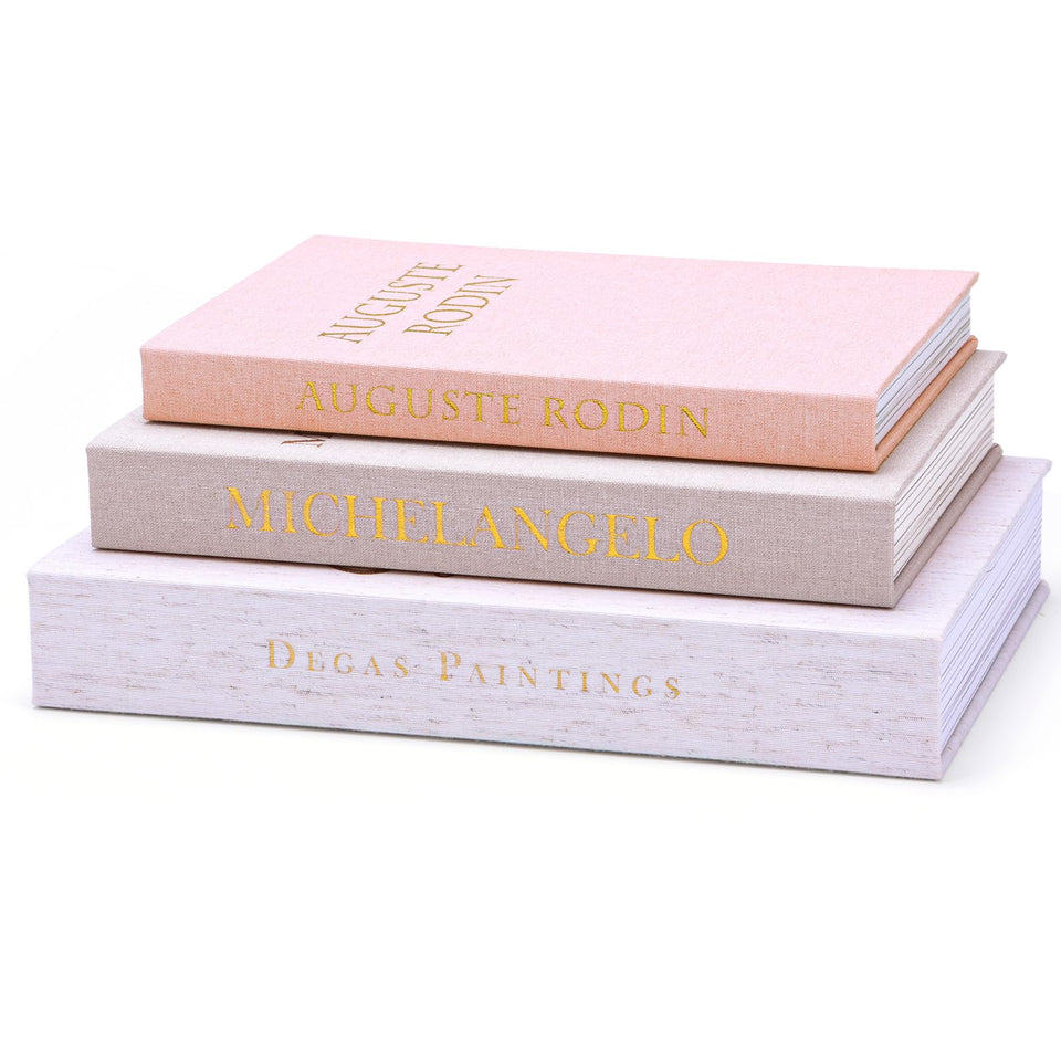 XKDOUS linen decorative books with gold foil cover on a coffee table for chic storage