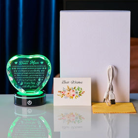 XLSJGYP crystal heart on its colorful LED base for ambient lighting.