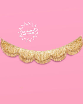 xo, Fetti gold foil fringe closeup adds sparkle to celebrations.