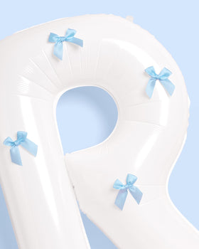 xo Fetti helium-ready balloons float for dramatic moments