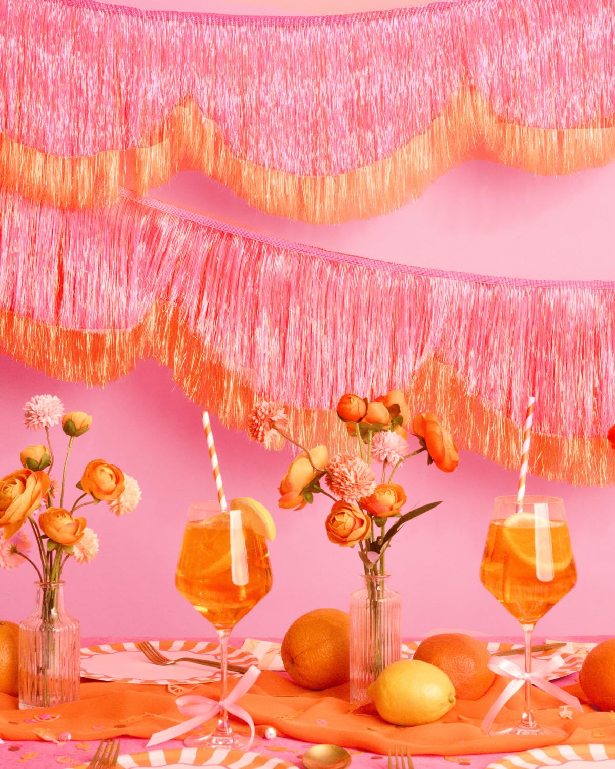 xo-fetti orange fringe layer provides bold color pop for celebrations.