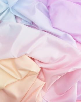 Close-up of the xo Fetti pastel gradient tablecloth polyester texture