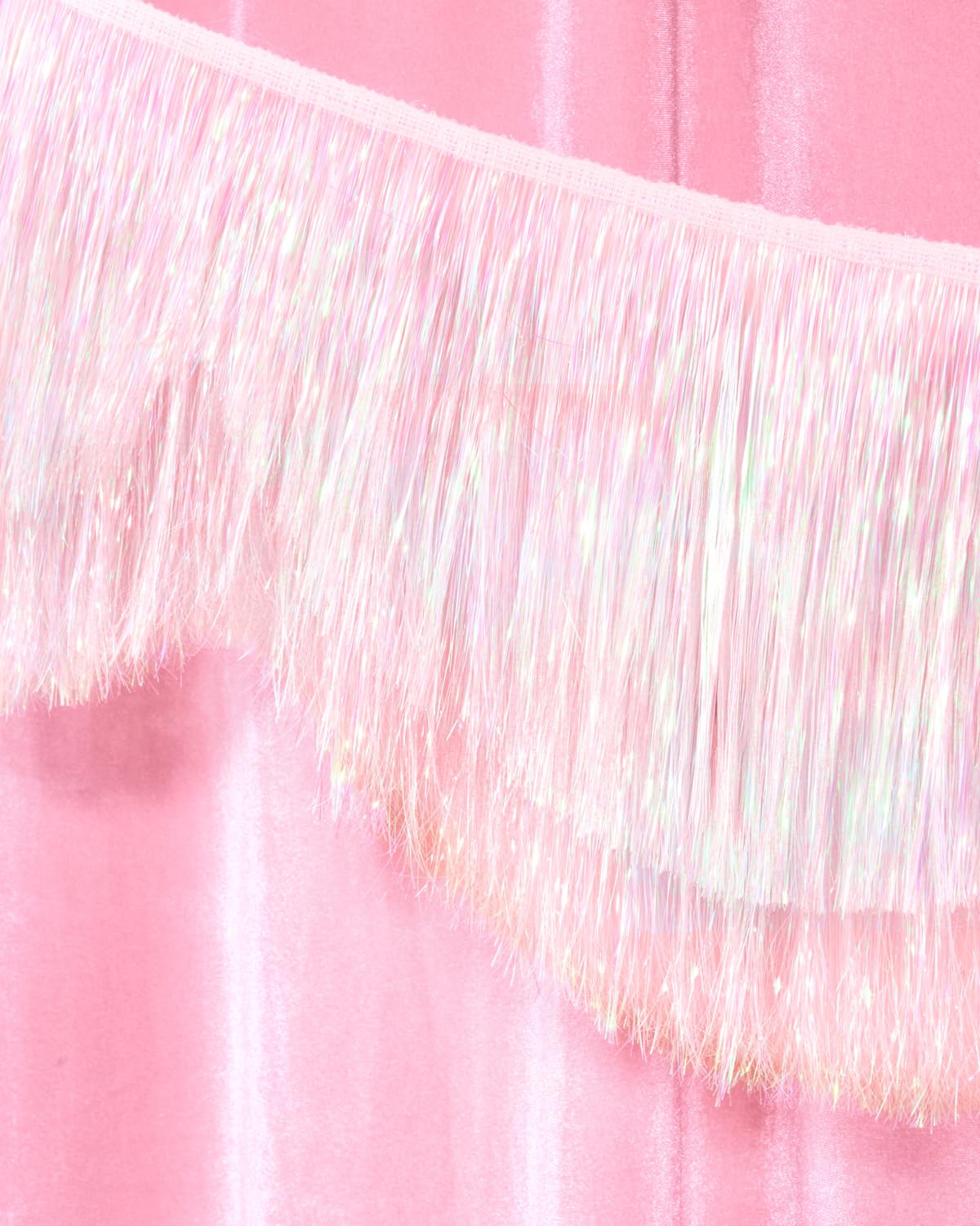 xo, Fetti iridescent banner catches light from every angle for glow-worthy shots