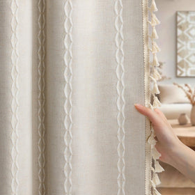 XOGUIBO Boho blackout curtain with gray liner, front view shows rich texture and light blocking.