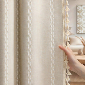Bedroom ambiance enhanced by beige linen-blend curtains.
