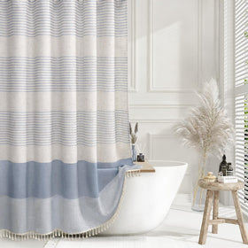 XOGUIBO light blue linen curtain with coastal stripe and tassel detail for a calm bathroom