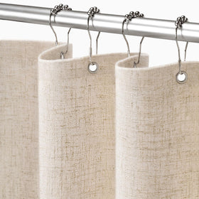 XOGUIBO linen shower curtain close-up highlights natural texture and cream color for privacy